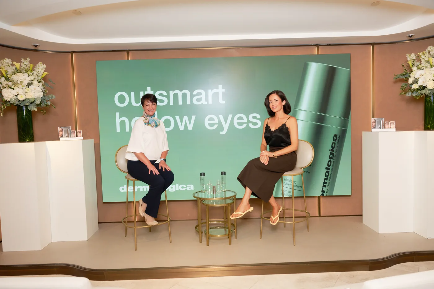 Dr Nina Bal and Dermalogica Education Manager Candice Gardner on stage at the Smart Eye Density masterclass at Harrods