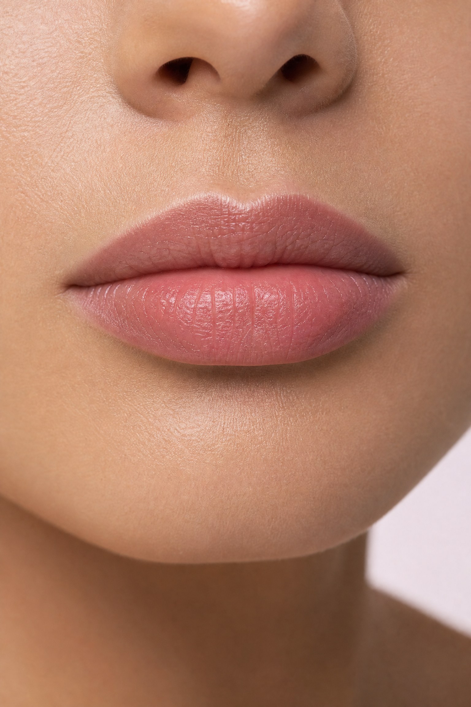Close-up portrait of naturally full, well-defined lips with a soft Cupid’s bow — lip fullness and definition treatments at Facial Sculpting London